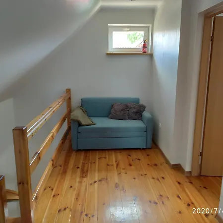 Casa de Férias Dom Letniskowy Zalesie Nad Jeziorem Tajty