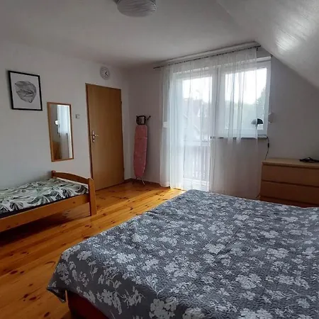 Casa de Férias Dom Letniskowy Zalesie Nad Jeziorem Tajty Wilkasy (Gizycko)